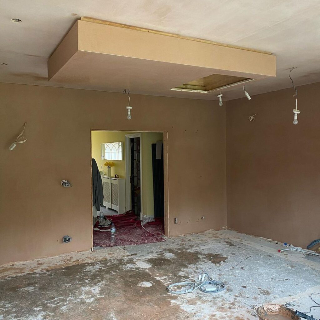 Full room plastering and skimming with freshly finished walls and ceiling by Smooth Touch Plastering in Enfield.
